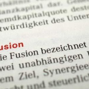 Fusión Empresarial en España: fusión por creación o fusión por absorción